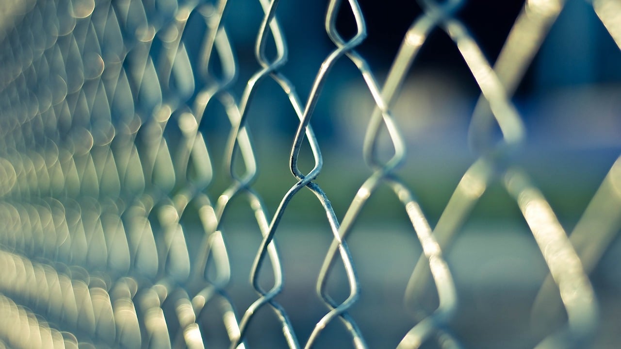 Depiction of a chain link fence to symbolize connection.